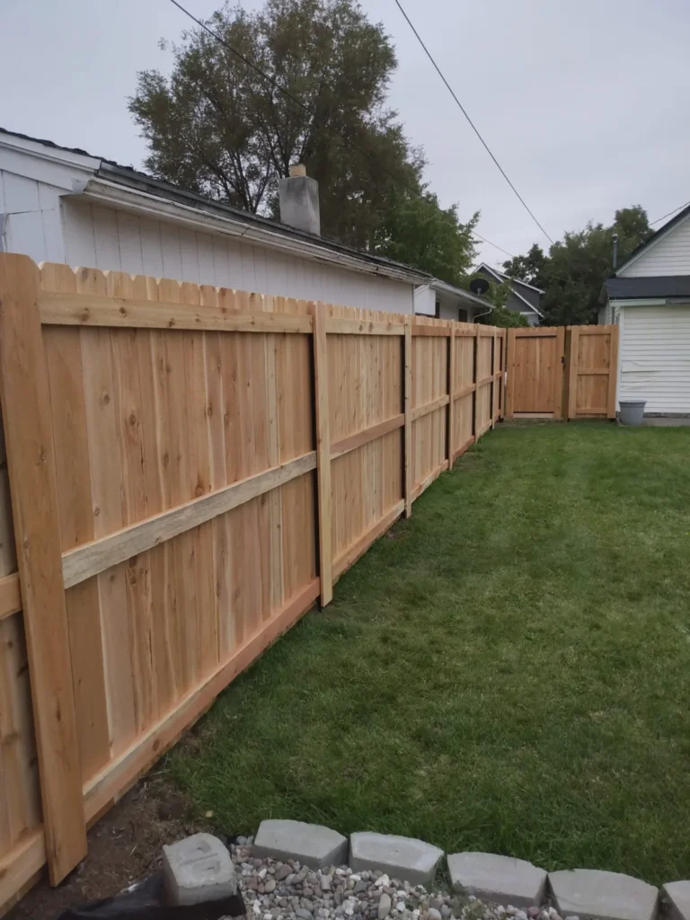Wood privacy along a corner lot — 2