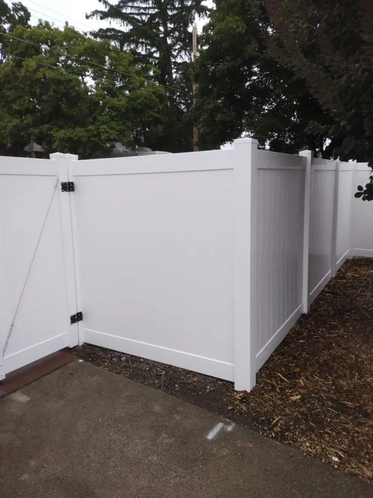 White vinyl driveway gates — 2